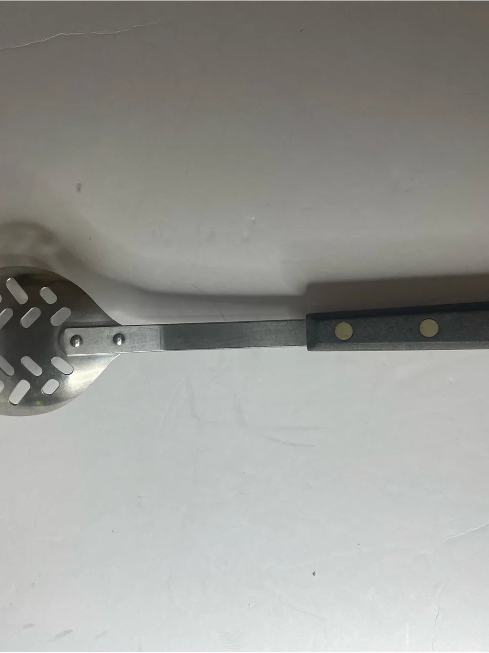 Vintage Ekco Stainless Steel Slotted Serving Spoon with Black Handle